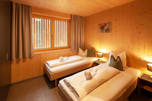 Posteľ alebo postele v izbe v ubytovaní Eichen Lodge Mellau