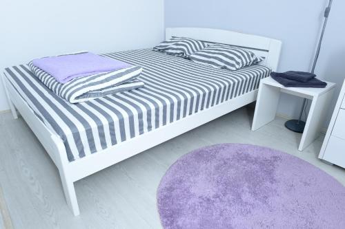 Cama o camas de una habitación en Apartmani Glavinić