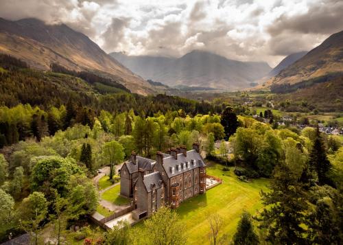 an aerial view of a house in the mountains at Glencoe House in Glencoe