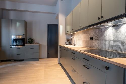 Dapur atau dapur kecil di Riddergaarden Leiligheter