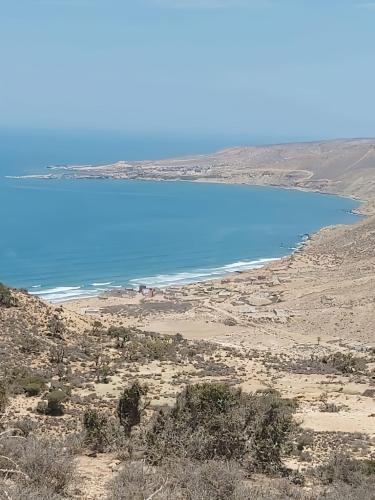 a view of the ocean from a hill at Tildi surf house in Imsouane