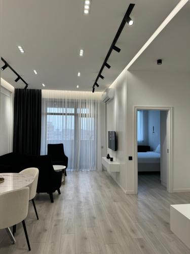TV a/nebo společenská místnost v ubytování White New Appartment
