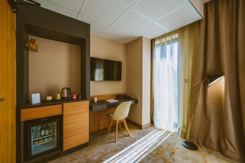 Kuchyň nebo kuchyňský kout v ubytování B1 Downtown Hotel