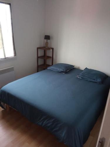 Postel nebo postele na pokoji v ubytování Petite maison chaleureuse avec une vue imprenable