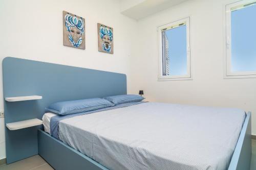 Postel nebo postele na pokoji v ubytování Etnabeach Apartament - Fondachello