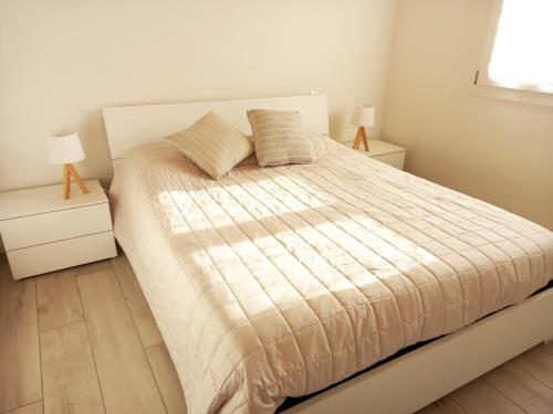 Ένα ή περισσότερα κρεβάτια σε δωμάτιο στο L'Oasi di Anna