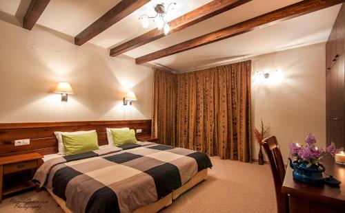 Cama ou camas em um quarto em Villa Chalet Everest