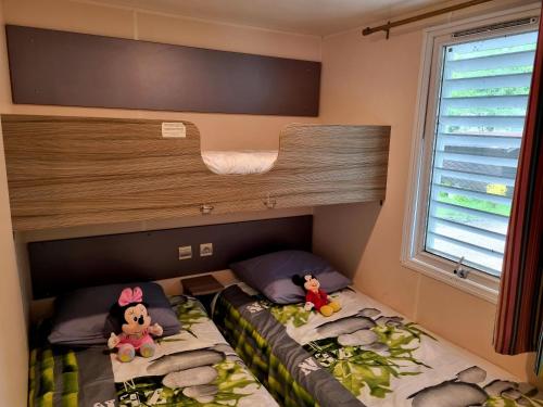 Ein Bett oder Betten in einem Zimmer der Unterkunft Parc de Nibelle