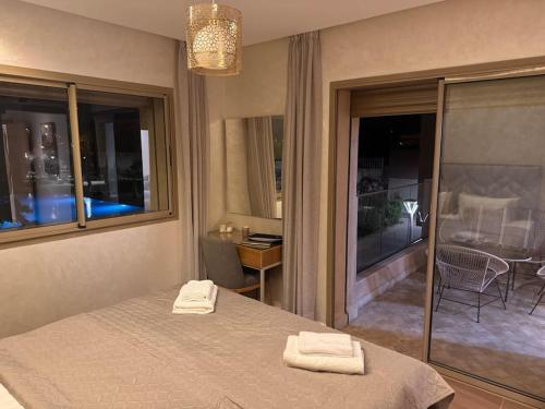 Postel nebo postele na pokoji v ubytování Luxuswohnung in Residence Coralia les orangers