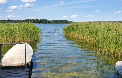 a boat in the middle of a body of water at 2 Bedroom Nice Home In Dabel in Dabel