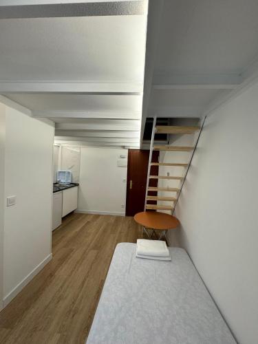 Giường trong phòng chung tại Aparsol Apartments