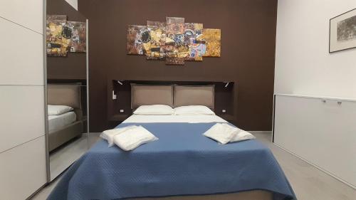 Ένα ή περισσότερα κρεβάτια σε δωμάτιο στο Caronda House 2