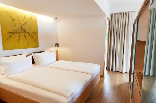 Un ou plusieurs lits dans un hébergement de l'établissement Steigenberger Hotel & Spa Krems