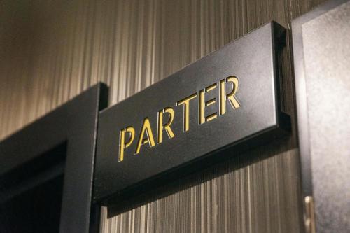 a sign on a door with the word panther on it at Haven Apart Nowa Sól in Nowa Sól