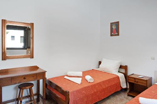 Postel nebo postele na pokoji v ubytování Serenity House