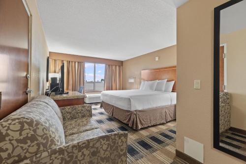 Postel nebo postele na pokoji v ubytování Hotel Executive Suites