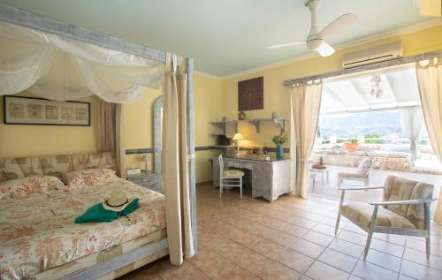Katil atau katil-katil dalam bilik di Villa Michel-Angelo BNB Karpathos