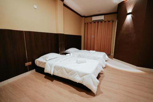 Ένα ή περισσότερα κρεβάτια σε δωμάτιο στο Tanjong Subang Jaya
