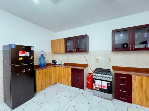 Kuchyň nebo kuchyňský kout v ubytování BLUE-OCEANVIEW 3BEDROOM APARTMENt IN NYALI WITH A SWIMMING