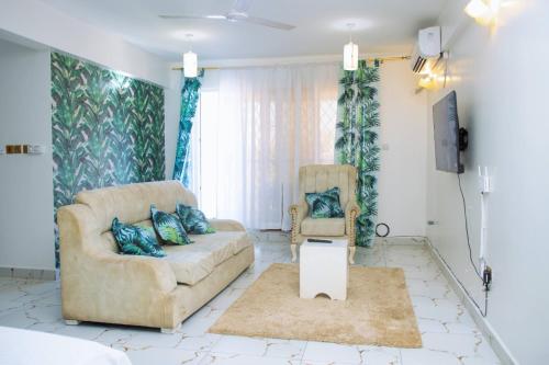 Posezení v ubytování BLUE-OCEANVIEW 3BEDROOM APARTMENt IN NYALI WITH A SWIMMING