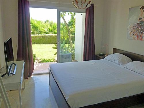 21 Alcazaba Lagoon groundfloor apt tropical garden
