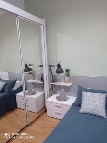 Ένα ή περισσότερα κρεβάτια σε δωμάτιο στο Apartamentos Casas Rurales "Paraje San Blas" TR-BA-00166