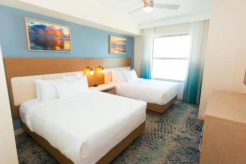 Postel nebo postele na pokoji v ubytování Holiday Inn Club Vacations Myrtle Beach Oceanfront