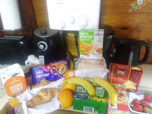 a counter top with a bunch of different types of food at Rosie and Jim Retreat with hot tub indoors amazing in Lincoln