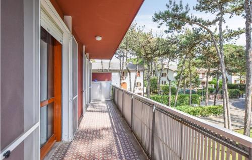 a balcony with a view of a street at Amazing Apartment In Lignano Sabbiadoro in Lignano Sabbiadoro