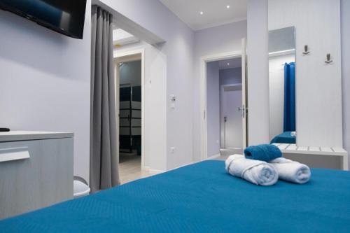 Postel nebo postele na pokoji v ubytování Pietre Azzurre Rooms