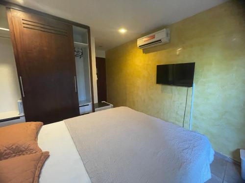 Μια τηλεόραση ή/και κέντρο ψυχαγωγίας στο Pipa Beleza - Hospedagem Econômica