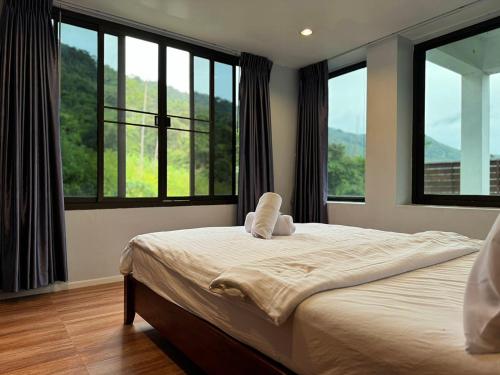 Postel nebo postele na pokoji v ubytování Koh Samui Palm View Villa
