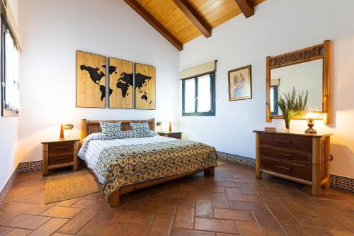 Un pat sau paturi într-o cameră la Finca Mis Morenas