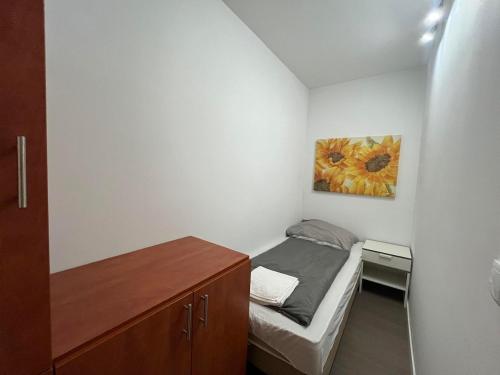 Posteľ alebo postele v izbe v ubytovaní Y Apartman