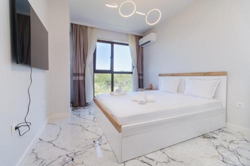 Postel nebo postele na pokoji v ubytování Lauta Forest 1-bedroom apartment