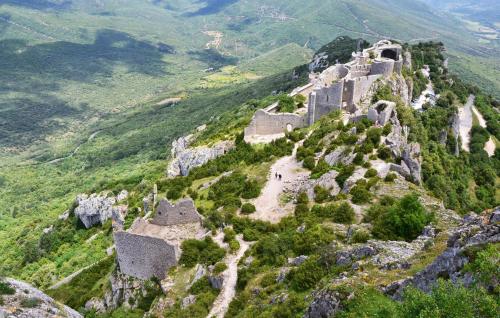 an old fortress on the side of a mountain at Beautiful Home In Saint-Laurent-De-La-Cabrerisse in Saint-Laurent-de-la-Cabrerisse