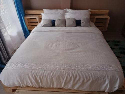 Postel nebo postele na pokoji v ubytování Talma Home