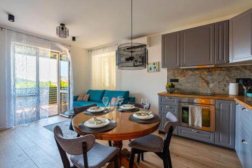 Η κουζίνα ή μικρή κουζίνα στο Apartments Marni