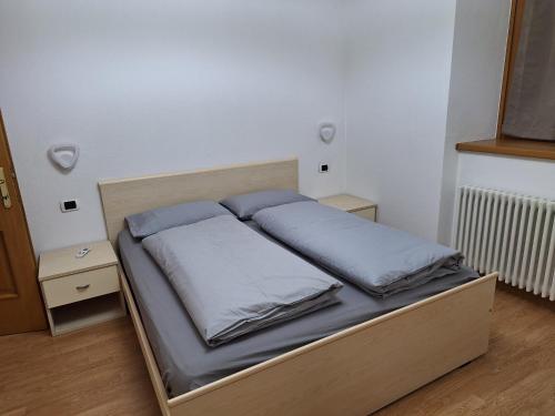 Postel nebo postele na pokoji v ubytování Appartamento Adele