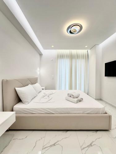Llit o llits en una habitació de Poseidon's Apartment