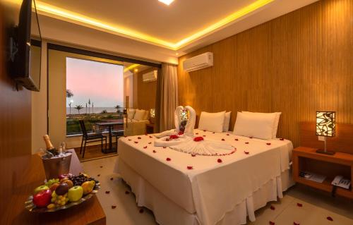 Quinta do Sol Praia Hotelにあるベッド