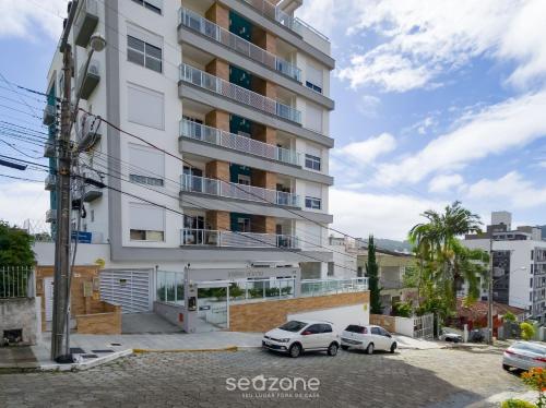 .cls-2{fill:#ff8000}.cls-3{fill:#febb02}.cls-5{fill:#c00}.cls-7{fill:#514d9e}Travel Proud Apartamentos próx a UFSC - SVE Menor preço em .cls-2{fill:#ff8000}.cls-3{fill:#febb02}.cls-5{fill:#c00}.cls-7{fill:#514d9e}Travel Proud Apartamentos próx a UFSC - SVE