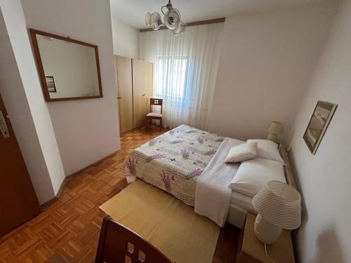 Posteľ alebo postele v izbe v ubytovaní Apartments Milo