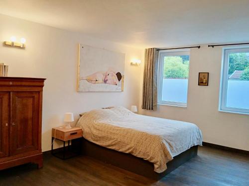 Postel nebo postele na pokoji v ubytování Appartement du peintre