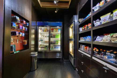 a refrigerator filled with lots of drinks at Courtyard by Marriott Wilmington Downtown/Historic District in Wilmington