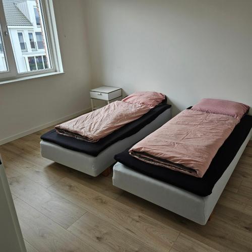 Postel nebo postele na pokoji v ubytování Residence Oosterhout