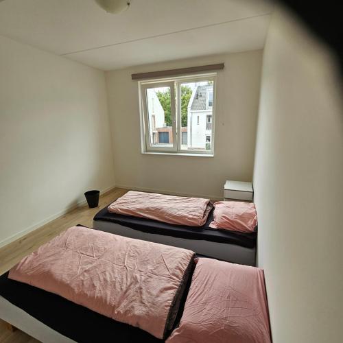 Postel nebo postele na pokoji v ubytování Residence Oosterhout