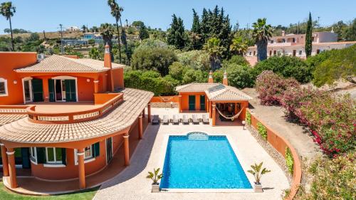 an aerial view of a house with a swimming pool at Quinta da Falfeira in Lagos