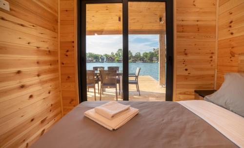 Postel nebo postele na pokoji v ubytování River house - Esperanza