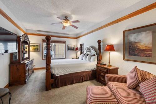 a bedroom with a bed and a ceiling fan at The Charter at Beaver Creek F215 in Beaver Creek